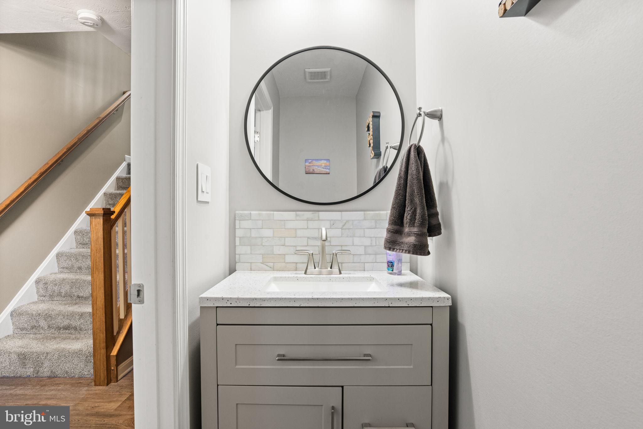 144 Overlook Dr. Hanover, PA 17331 - Photo 7 of 35 a bathroom with a sink and a mirror