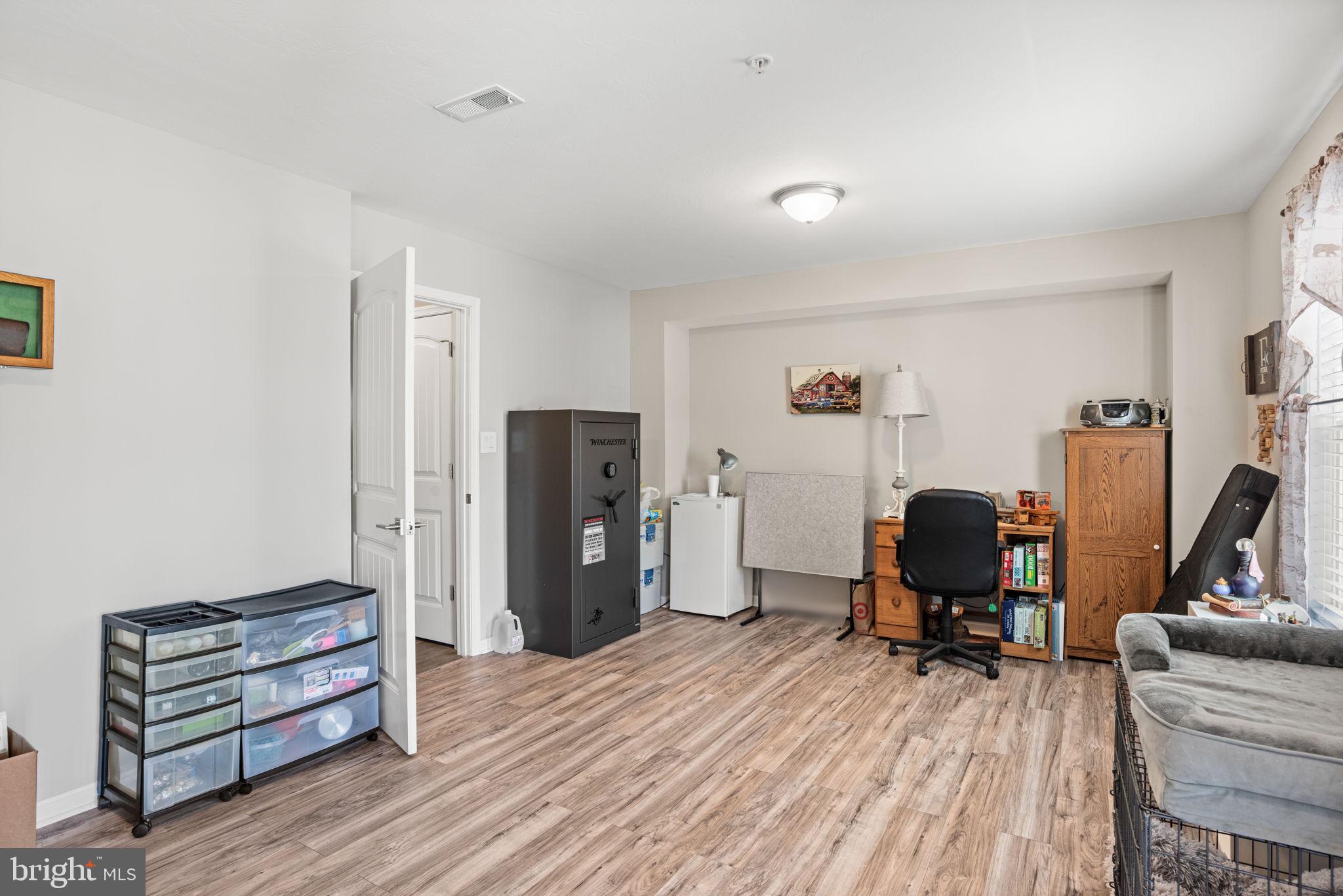 144 Overlook Dr. Hanover, PA 17331 - Photo 8 of 35 a view of a workspace with furniture and wooden floor