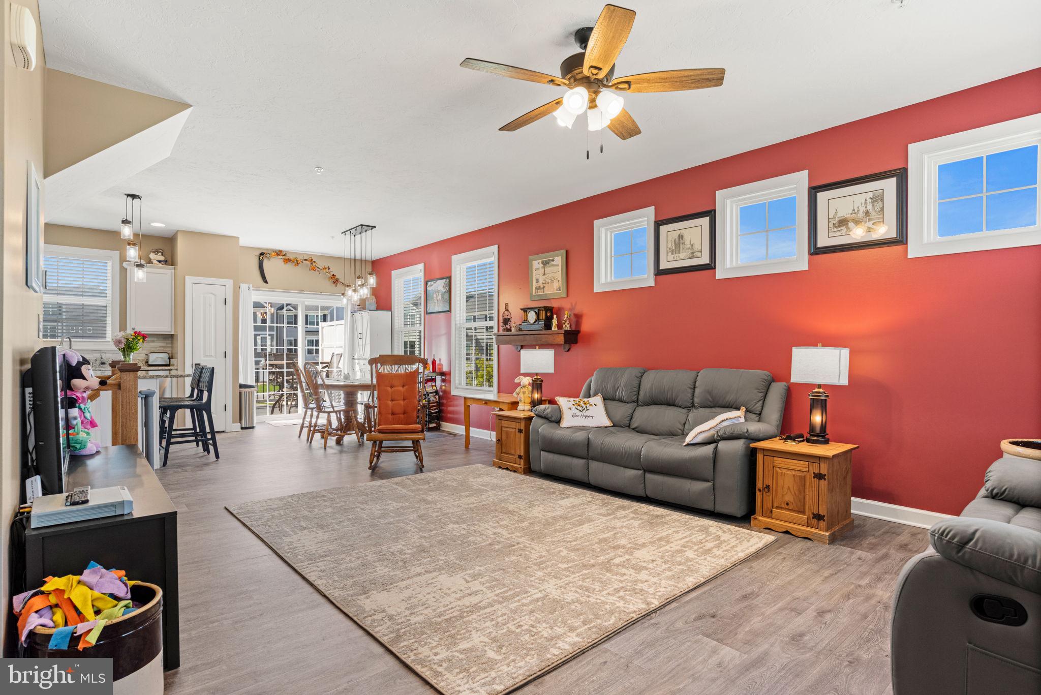 144 Overlook Dr. Hanover, PA 17331 - Photo 10 of 35 a living room filled with furniture and a chandelier