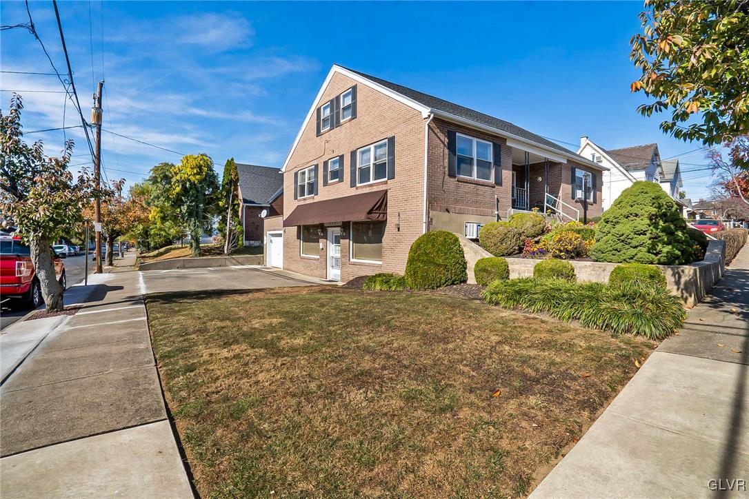 802 Spring Street Bethlehem, PA 18018 - Photo 1 of 14 a front view of a house with a yard