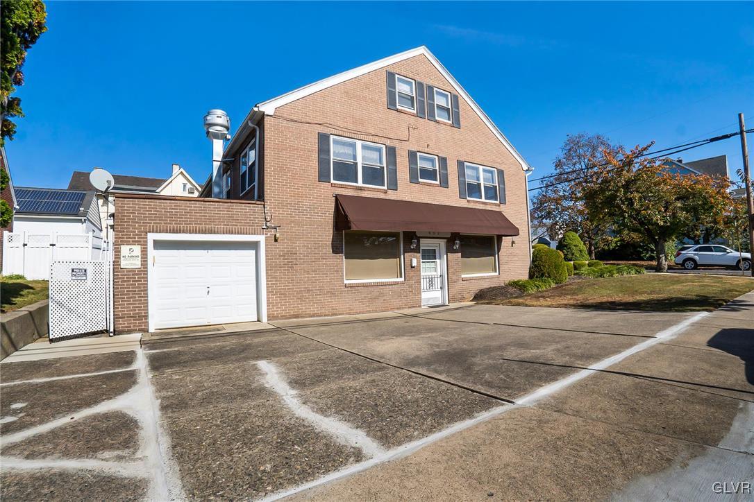 802 Spring Street Bethlehem, PA 18018 - Photo 3 of 14 a front view of a house with a yard