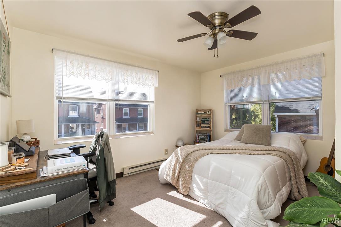 802 Spring Street Bethlehem, PA 18018 - Photo 5 of 14 a bedroom with a bed and a window