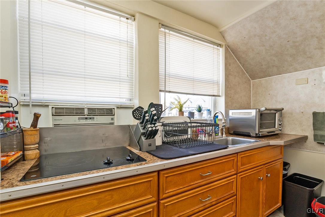 802 Spring Street Bethlehem, PA 18018 - Photo 10 of 14 a kitchen with sink refrigerator and window