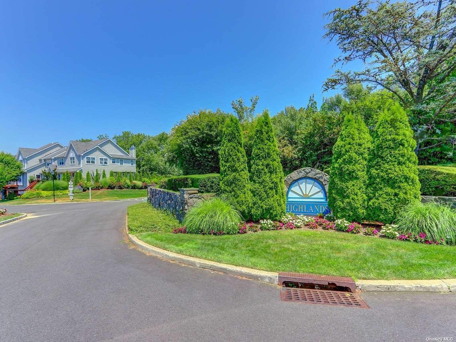 229 Windward Court North Port Jefferson, NY 11777 - Photo 1 of 1 a view of a park with large trees and plants