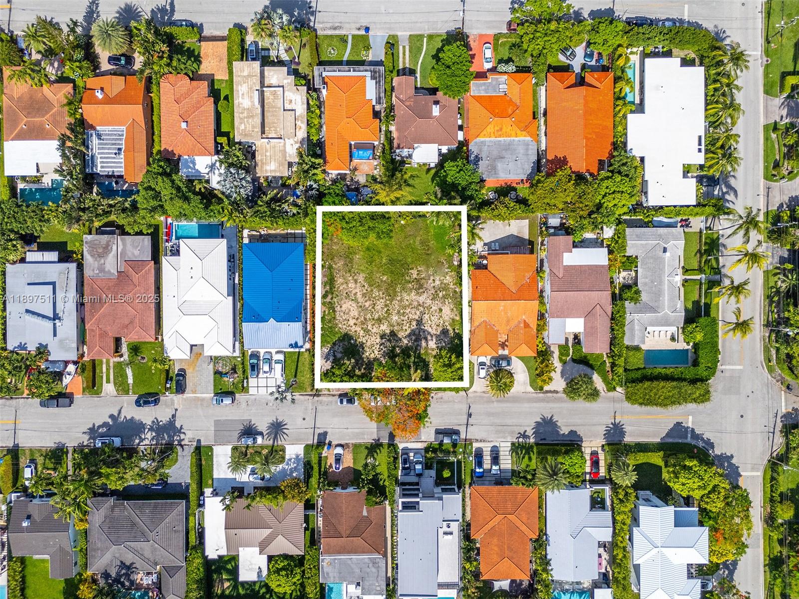 8835 Froude Avenue Surfside, FL 33154 - Photo 2 of 13 view of a city with tall buildings