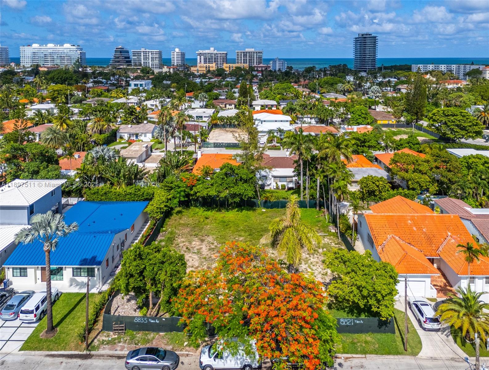8835 Froude Avenue Surfside, FL 33154 - Photo 9 of 13 an aerial view of residential houses with outdoor space and swimming pool