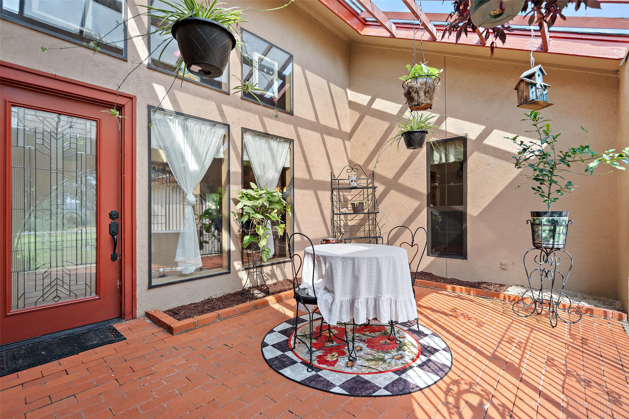 23200 Fulkes Road Leander, TX 78641 - Photo 11 of 15 A private, brick-paved patio offers an intimate outdoor retreat.