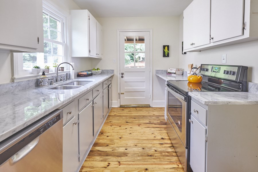 1829 Forest Road Durham, NC 27705 - Photo 14 of 25 Kitchen opens out onto back deck