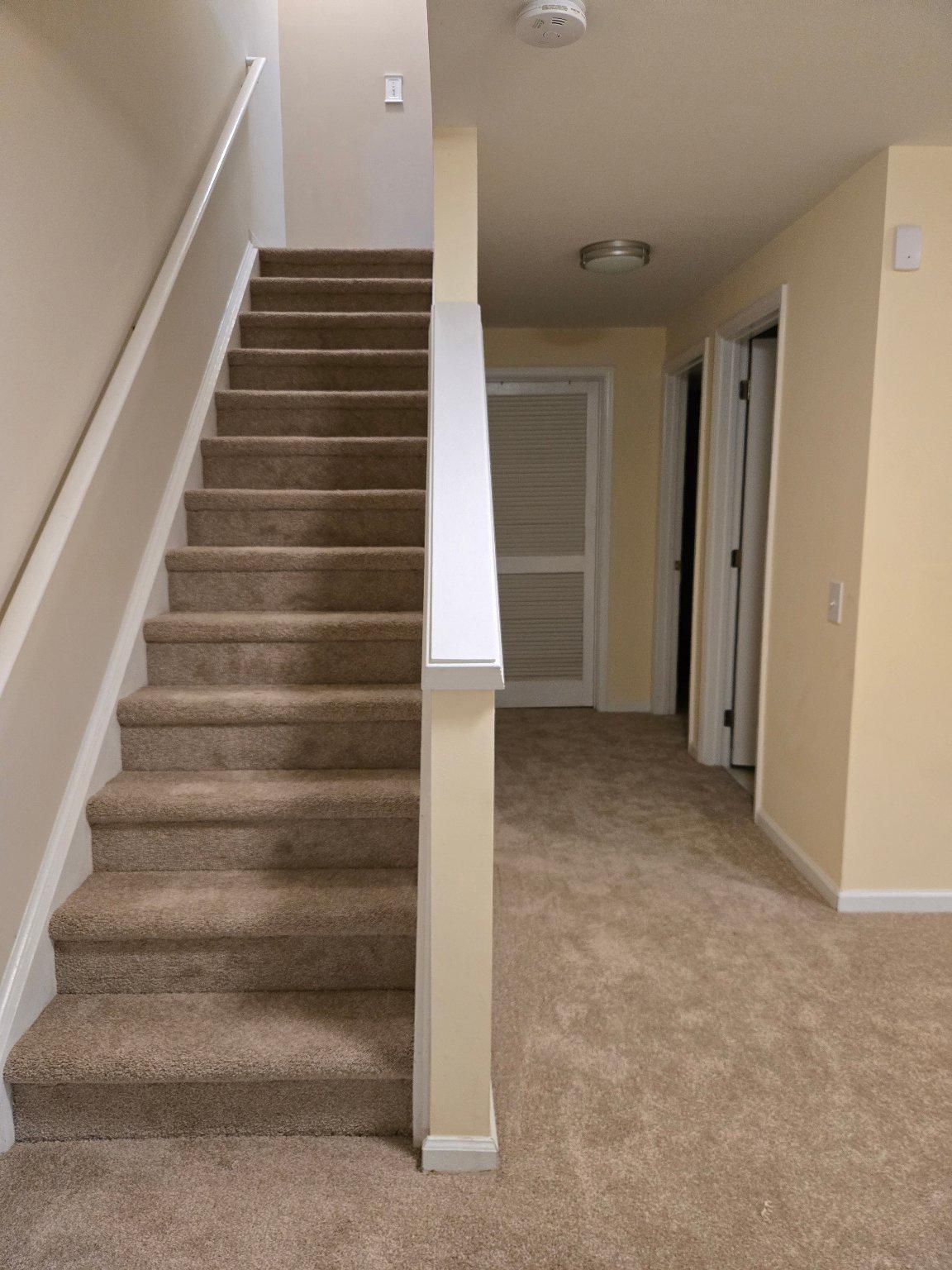 1765 Rochelle Court Woodbridge, VA 22192 - Photo 19 of 34 Staircase off of media room. Hallway leads to den.