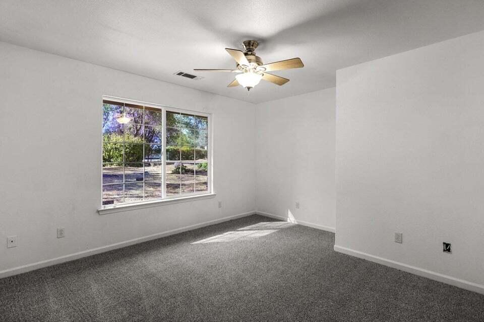 16840 Hawthorne Avenue Anderson, CA 96007 - Photo 21 of 37 a view of an empty room with a window