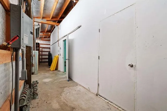 a view of a hallway to other room