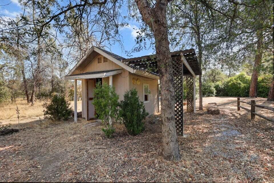 16840 Hawthorne Avenue Anderson, CA 96007 - Photo 30 of 37 a view of a house with a tree in the yard