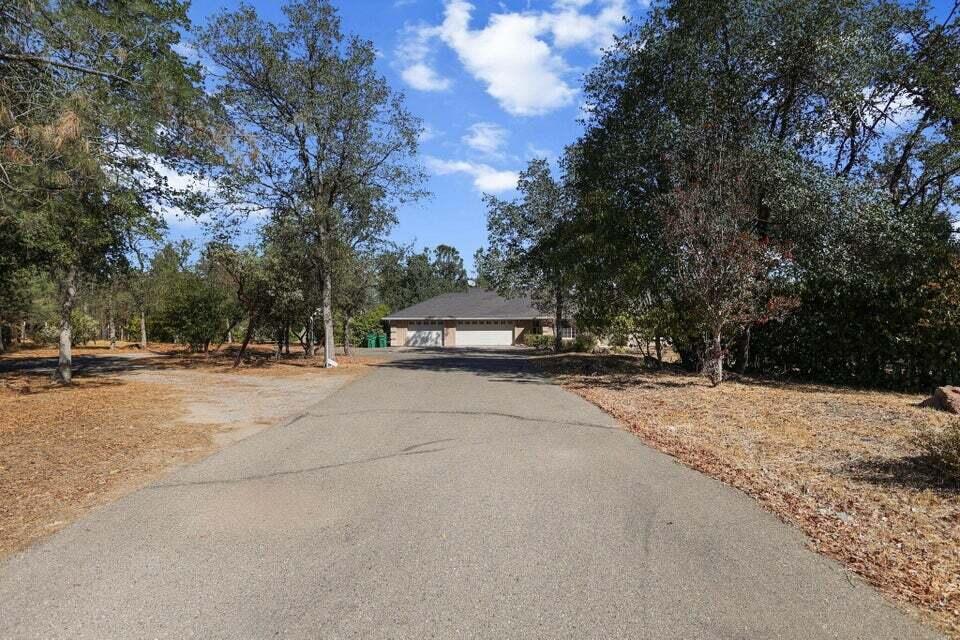16840 Hawthorne Avenue Anderson, CA 96007 - Photo 34 of 37 a car parked on the side of the road