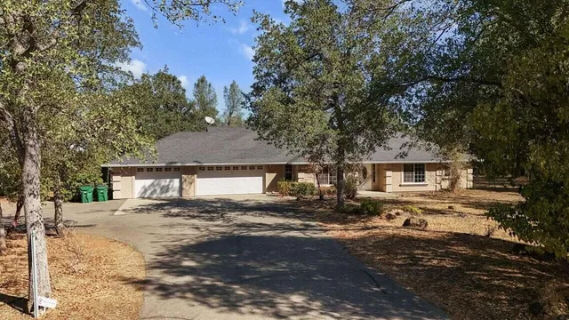 view of a house with a yard