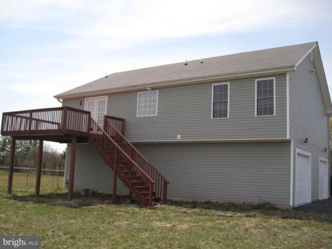 290 Ruebuck Road Clear Brook, VA 22624 - Photo 1 of 28 a view of a house with wooden fence