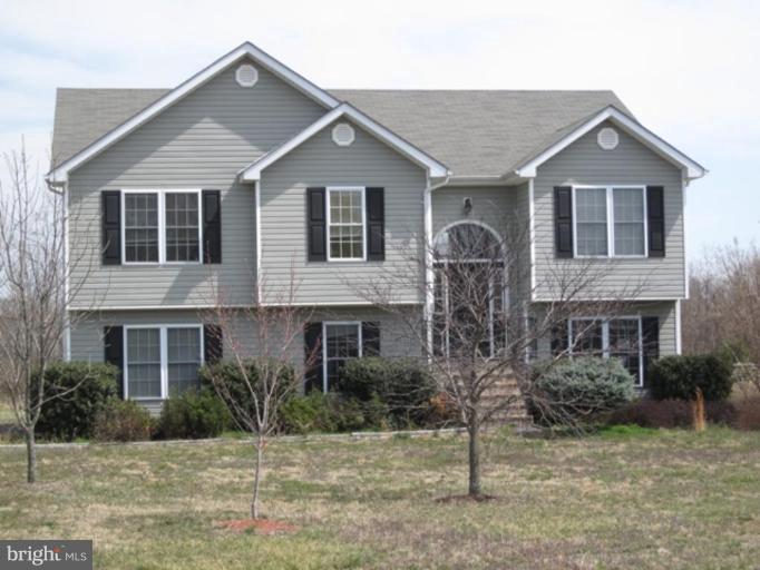 290 Ruebuck Road Clear Brook, VA 22624 - Photo 14 of 28 a front view of a house with a yard
