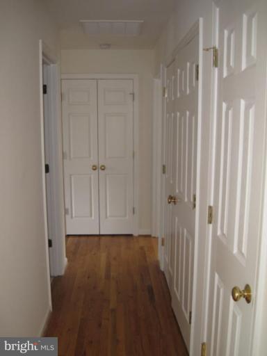 290 Ruebuck Road Clear Brook, VA 22624 - Photo 19 of 28 a view of a hallway with wooden floor