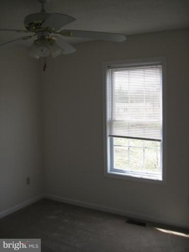 290 Ruebuck Road Clear Brook, VA 22624 - Photo 20 of 28 an empty room with a window