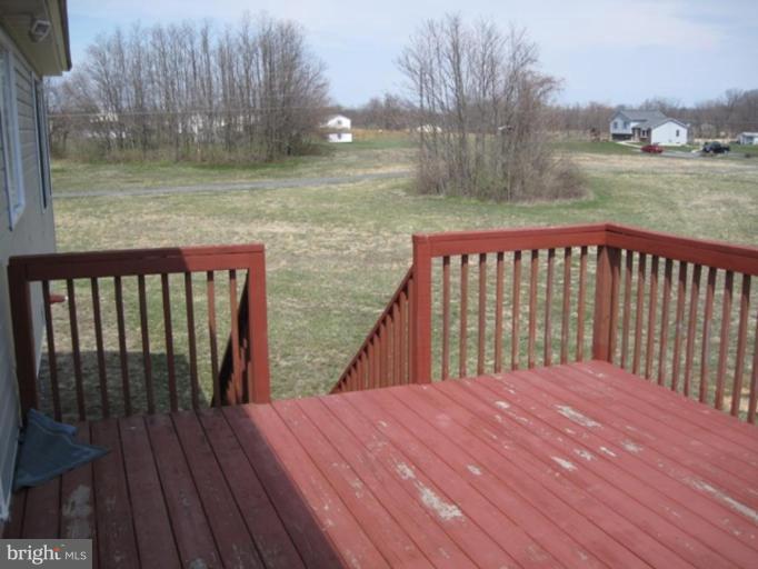 290 Ruebuck Road Clear Brook, VA 22624 - Photo 26 of 28 a balcony with wooden floor