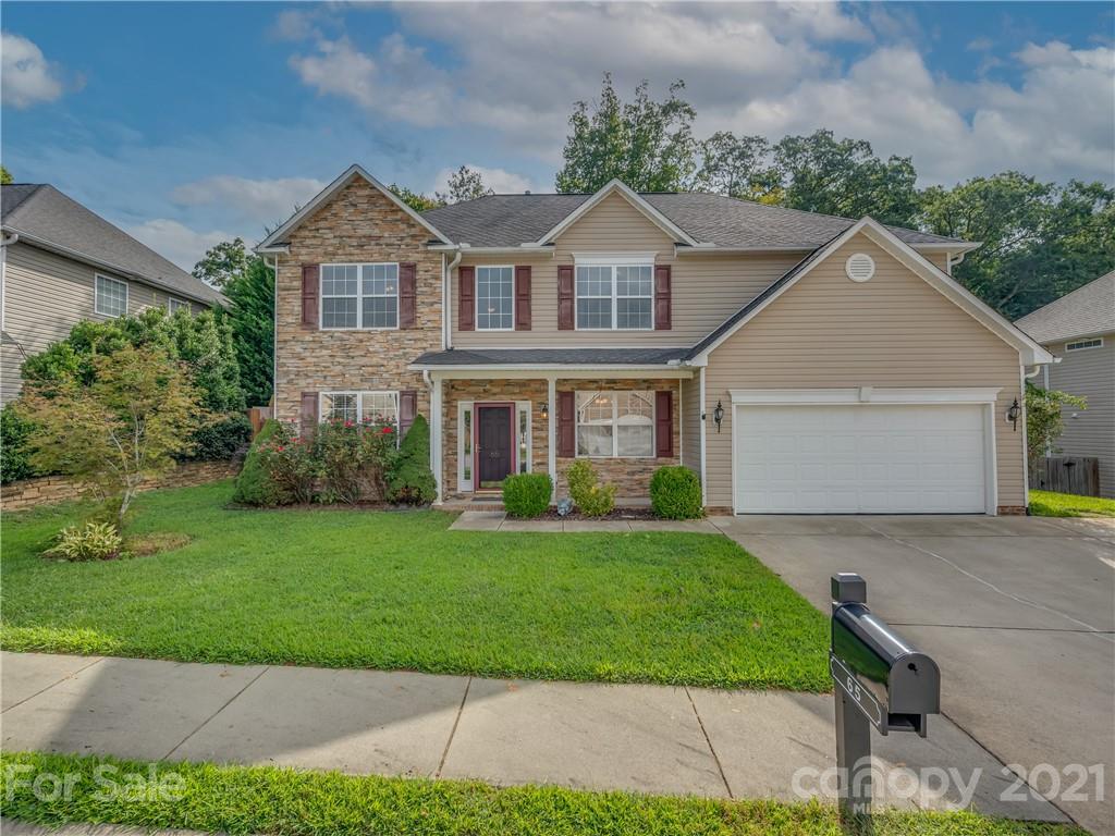 65 Wildbriar Road, Unit 49 Fletcher, NC 28732 - Photo 1 of 43 a front view of a house with a yard
