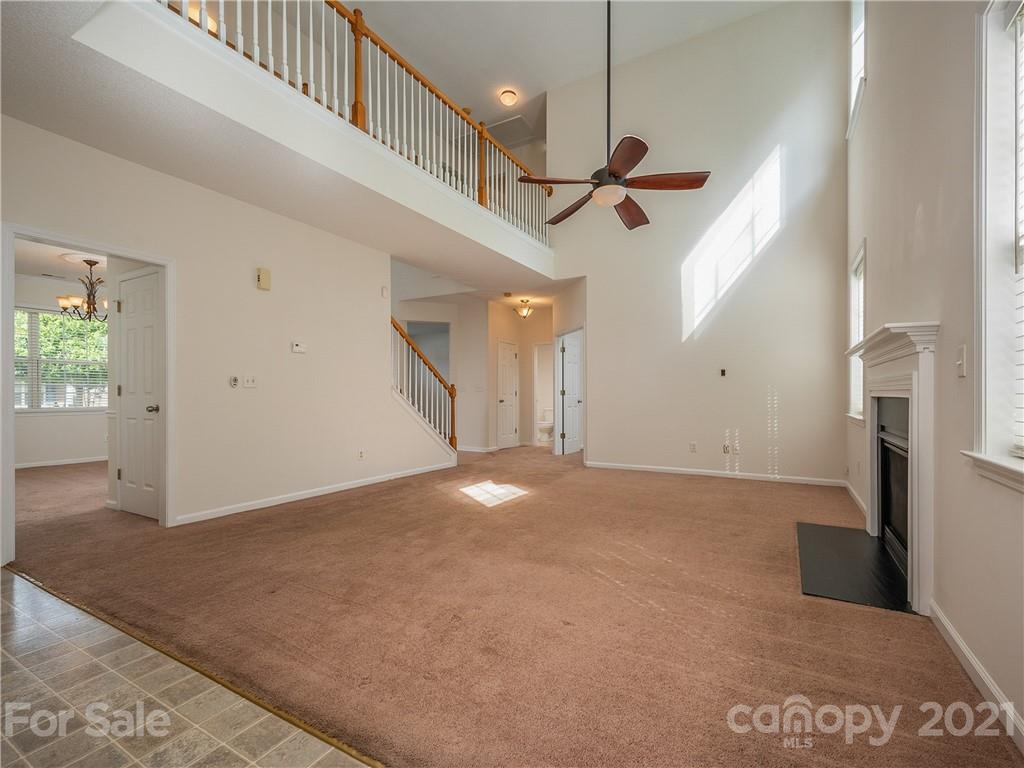 65 Wildbriar Road, Unit 49 Fletcher, NC 28732 - Photo 12 of 43 a view of a big room with closet and windows