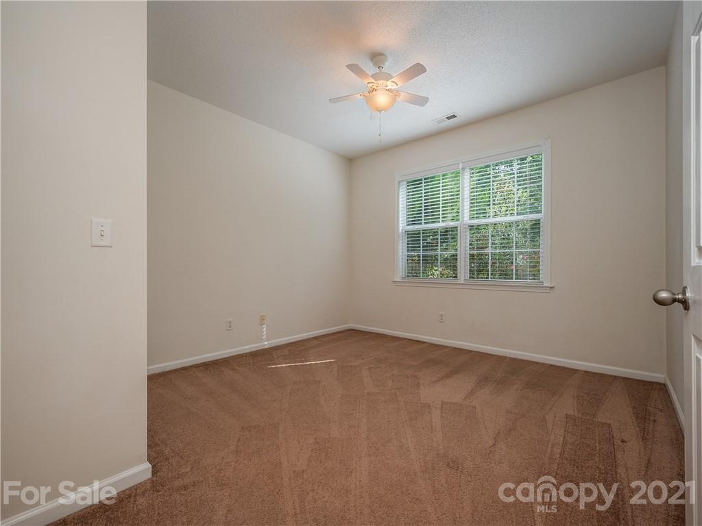 65 Wildbriar Road, Unit 49 Fletcher, NC 28732 - Photo 19 of 43 an empty room with windows