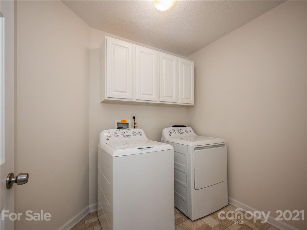 65 Wildbriar Road, Unit 49 Fletcher, NC 28732 - Photo 22 of 43 a utility room with dryer and washer