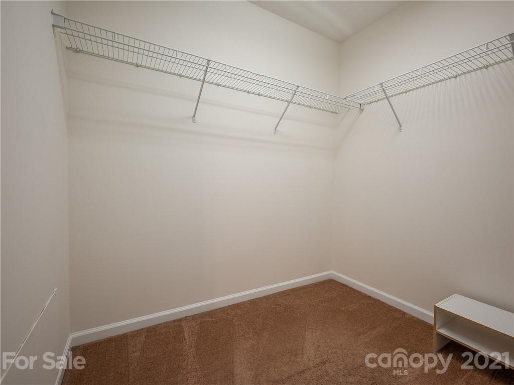 65 Wildbriar Road, Unit 49 Fletcher, NC 28732 - Photo 29 of 43 a view of small space with racks on the wall
