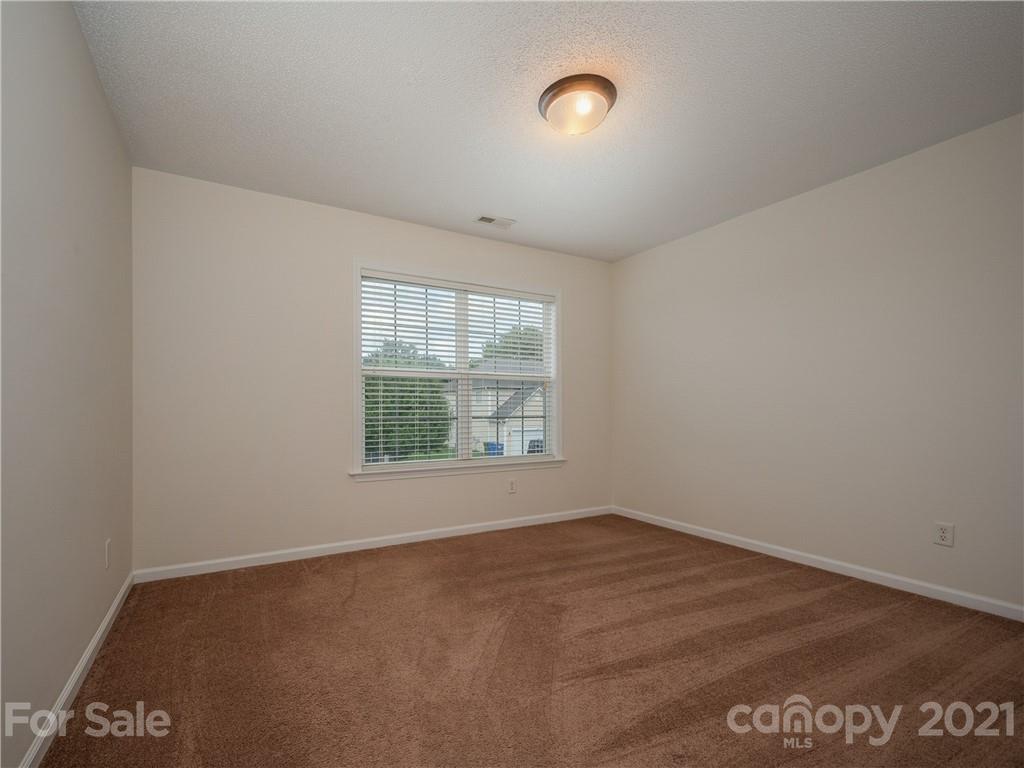 65 Wildbriar Road, Unit 49 Fletcher, NC 28732 - Photo 32 of 43 an empty room with a window