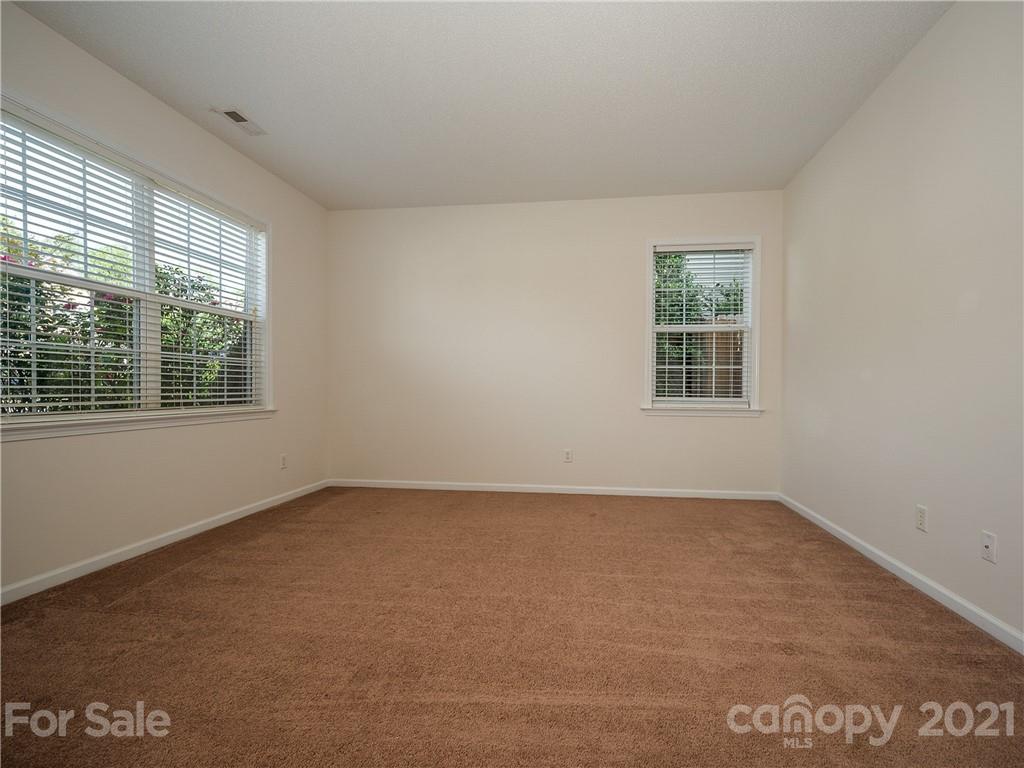 65 Wildbriar Road, Unit 49 Fletcher, NC 28732 - Photo 8 of 43 an empty room with a window