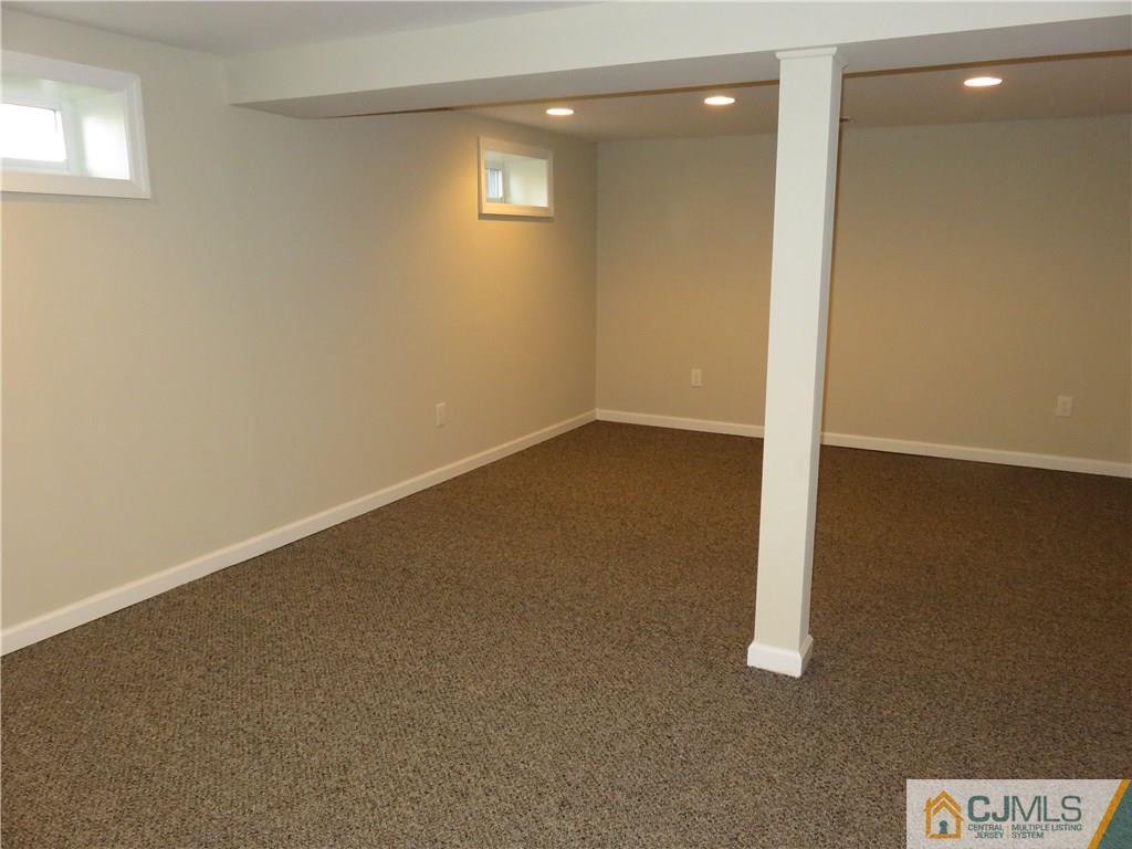 7 Roger Road Edison, NJ 08817 - Photo 13 of 14 a view of an empty room with a window