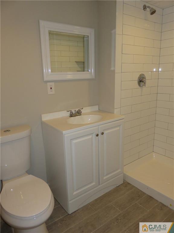 7 Roger Road Edison, NJ 08817 - Photo 14 of 14 a bathroom with a toilet sink and shower