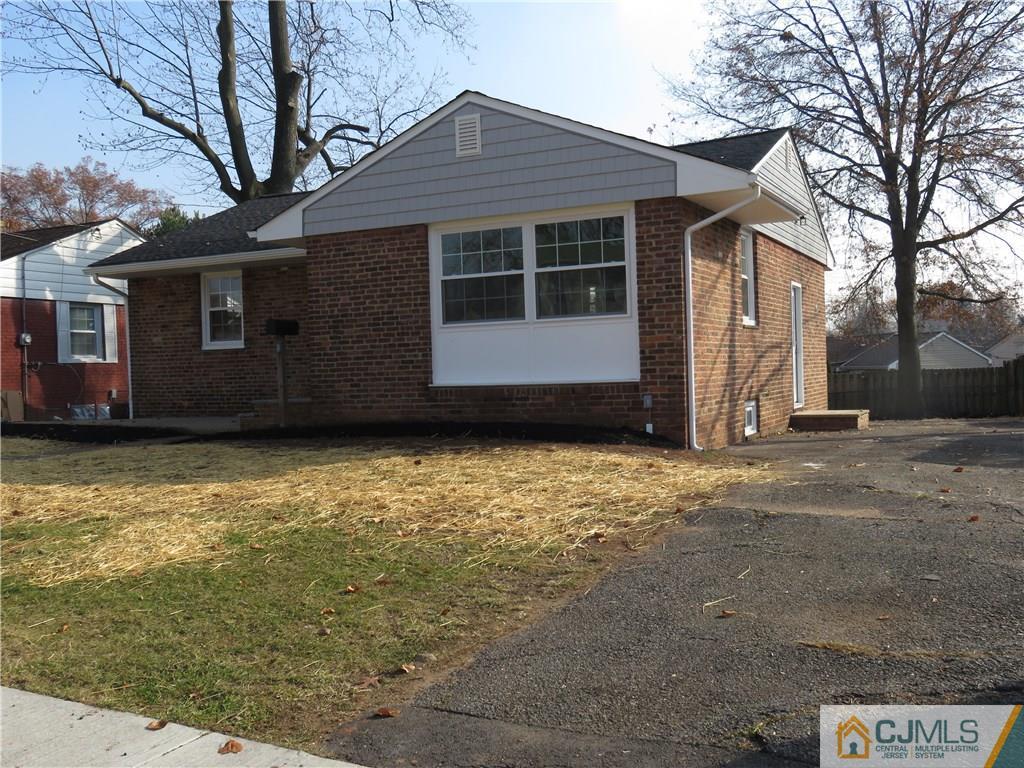 7 Roger Road Edison, NJ 08817 - Photo 3 of 14 a house view with a garden space