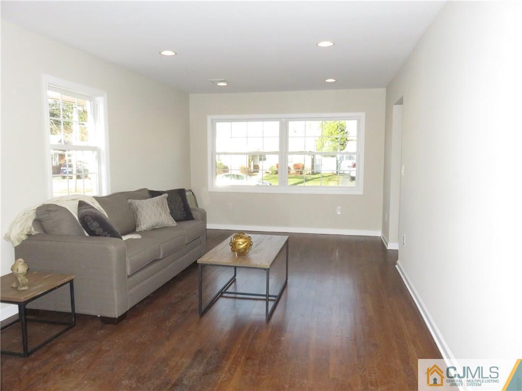7 Roger Road Edison, NJ 08817 - Photo 6 of 14 a living room with furniture and a window