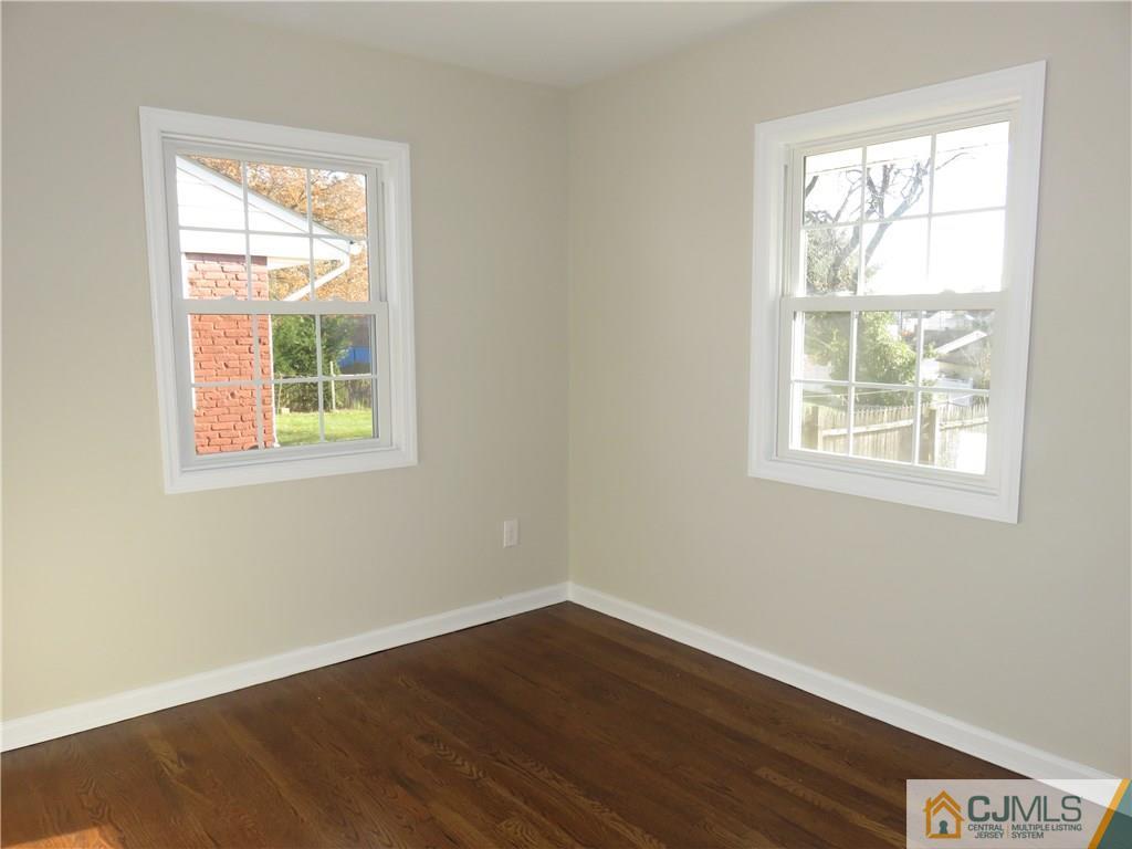 7 Roger Road Edison, NJ 08817 - Photo 9 of 14 an empty room with a window