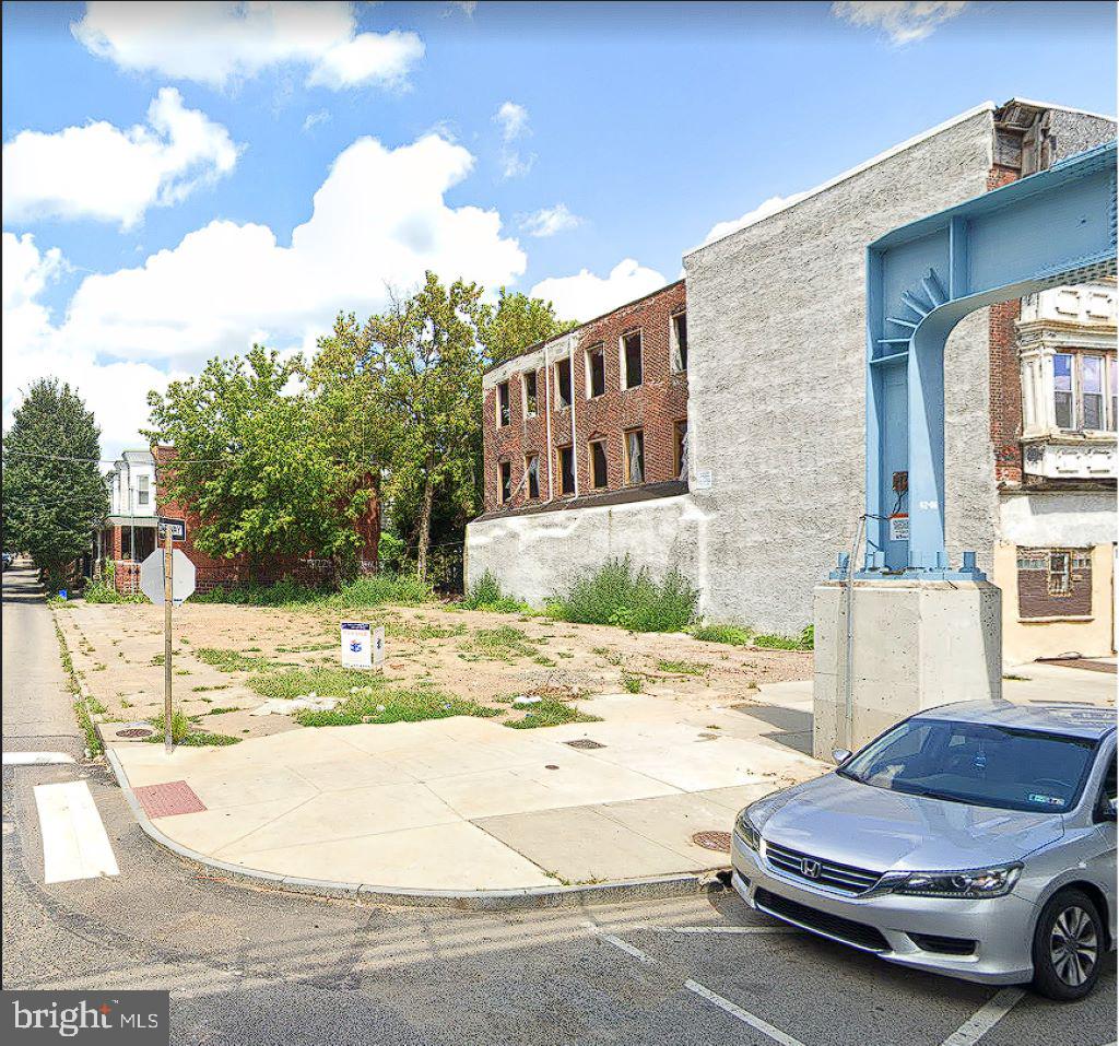 6233 Market Street Philadelphia, PA 19139 - Photo 1 of 1 a car parked on the side of the road