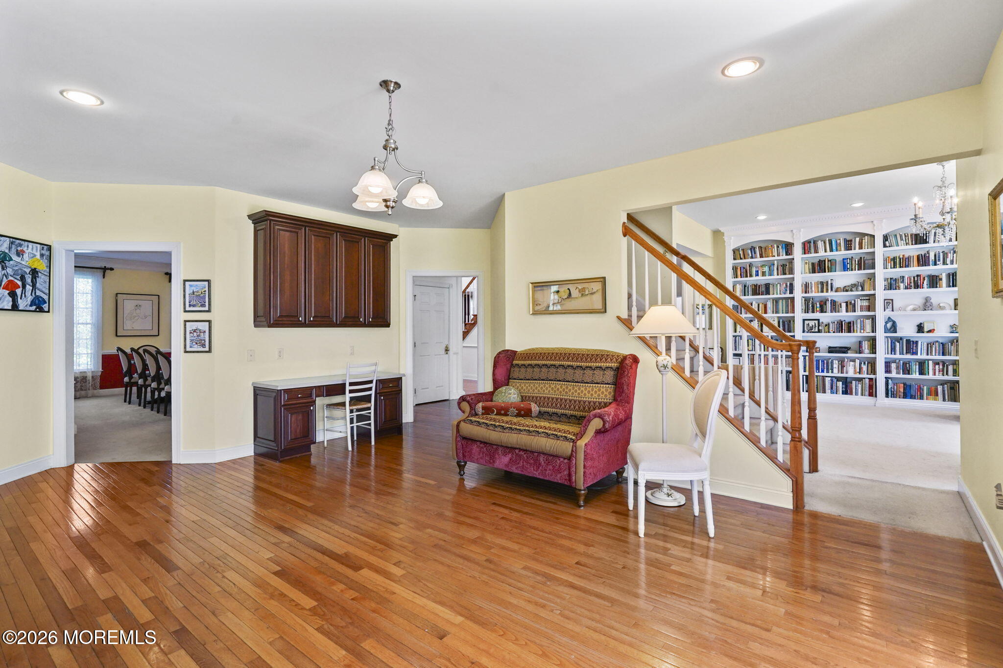 10 Rockingham Court Manalapan, NJ 07726 - Photo 26 of 91 a living room with furniture and a wooden floor