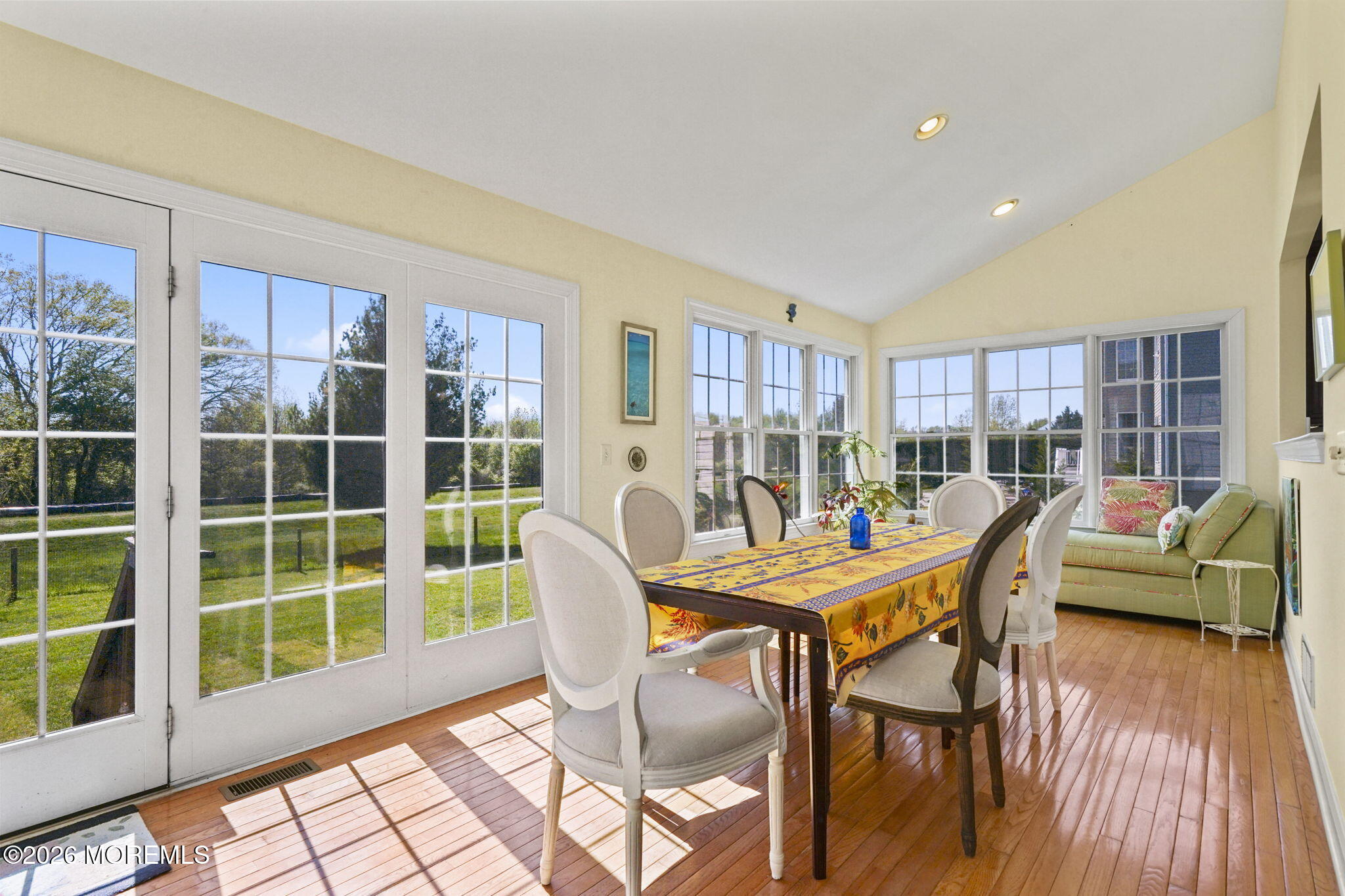10 Rockingham Court Manalapan, NJ 07726 - Photo 28 of 91 a dining room with furniture and wooden floor