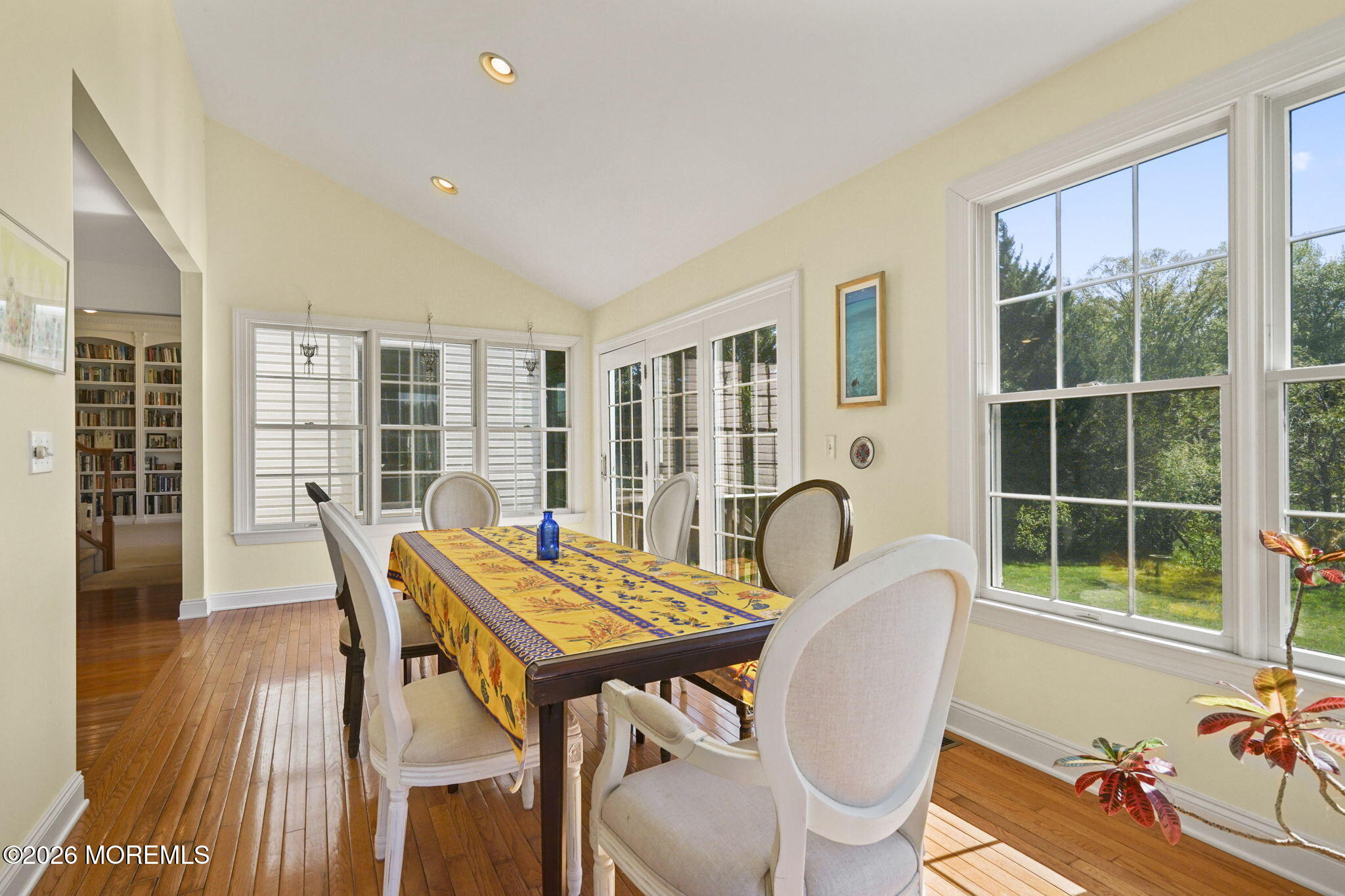 10 Rockingham Court Manalapan, NJ 07726 - Photo 29 of 91 a dining room with furniture window and wooden floor