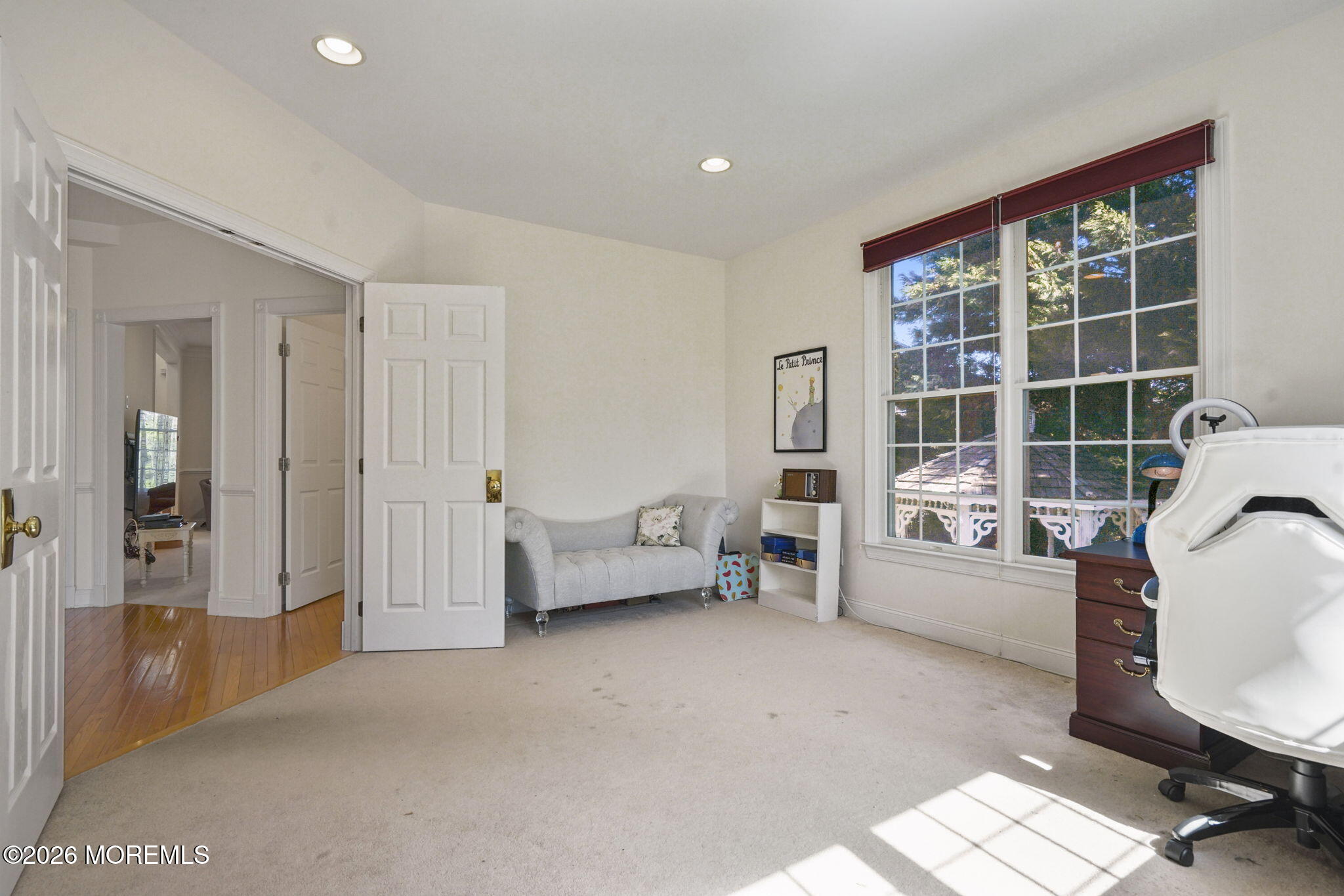 10 Rockingham Court Manalapan, NJ 07726 - Photo 30 of 91 a view of living room filled with furniture and large window