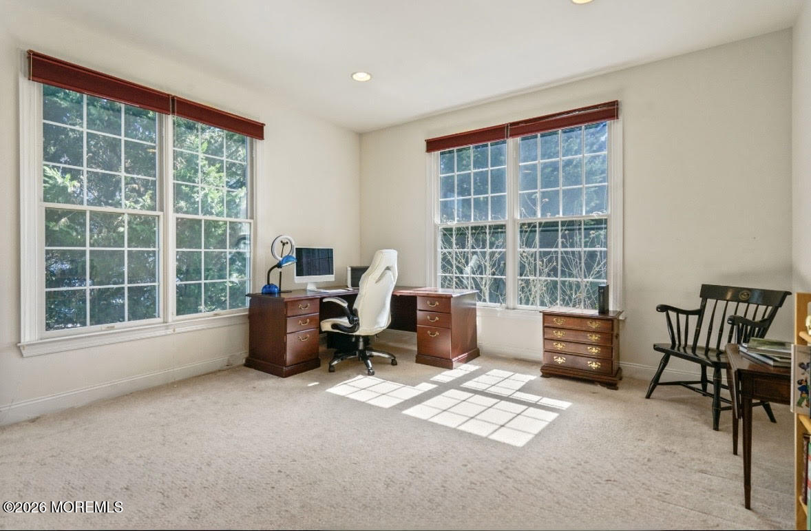 10 Rockingham Court Manalapan, NJ 07726 - Photo 31 of 91 a living room with furniture and a window