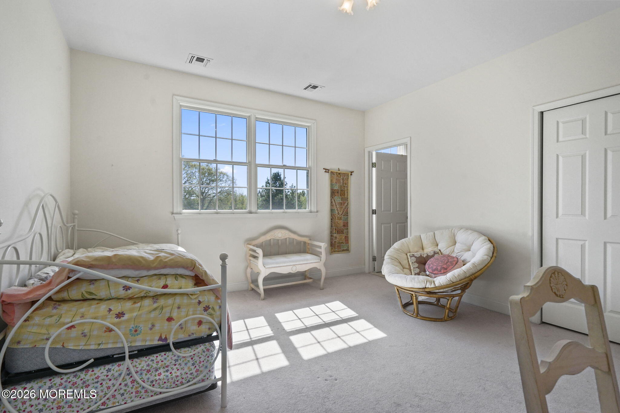 10 Rockingham Court Manalapan, NJ 07726 - Photo 46 of 91 a living room with furniture and a window