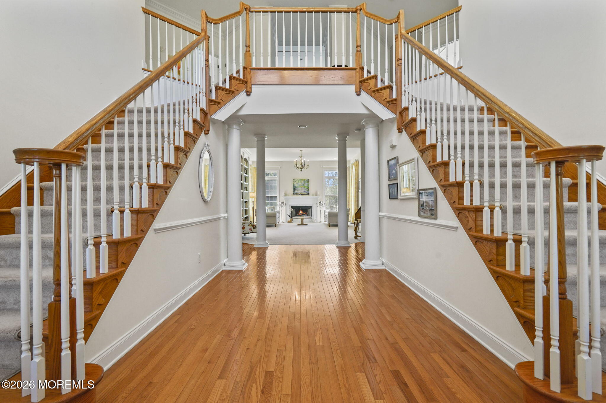 10 Rockingham Court Manalapan, NJ 07726 - Photo 5 of 91 a view of entryway and hall with wooden floor