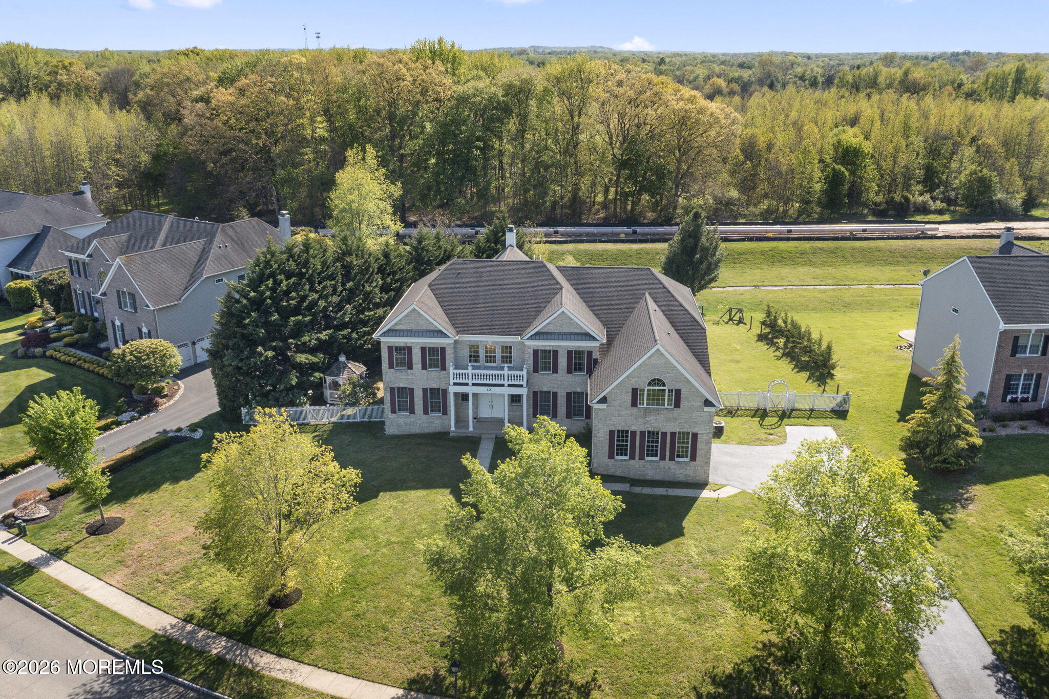 10 Rockingham Court Manalapan, NJ 07726 - Photo 76 of 91 a view of a house with a ocean view
