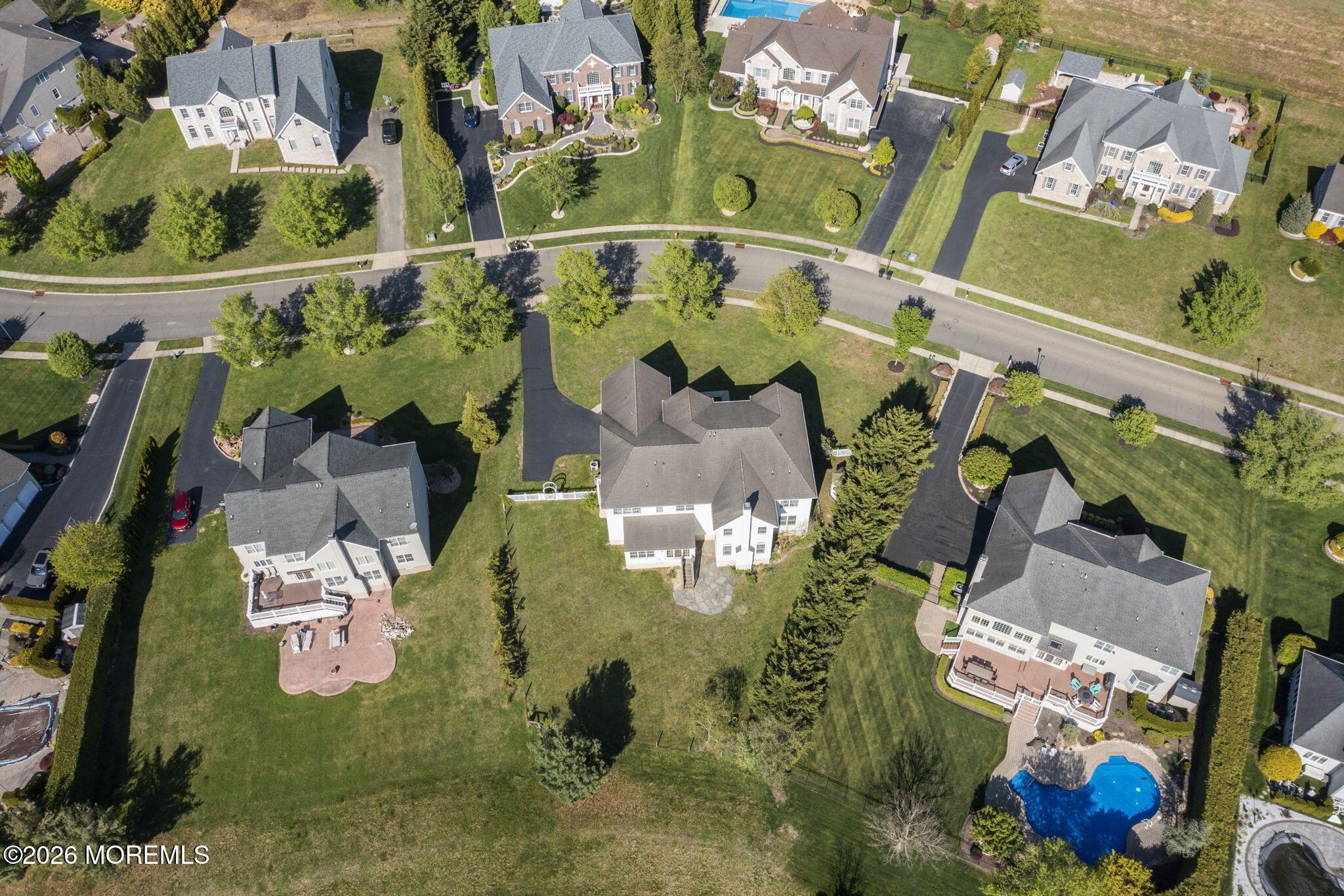 10 Rockingham Court Manalapan, NJ 07726 - Photo 81 of 91 an aerial view of a swimming pool