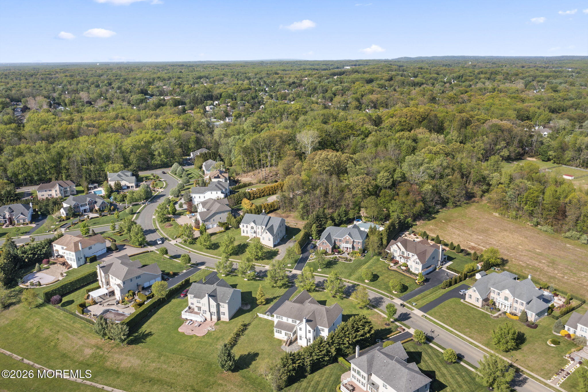 10 Rockingham Court Manalapan, NJ 07726 - Photo 85 of 91 an aerial view of residential houses with outdoor space