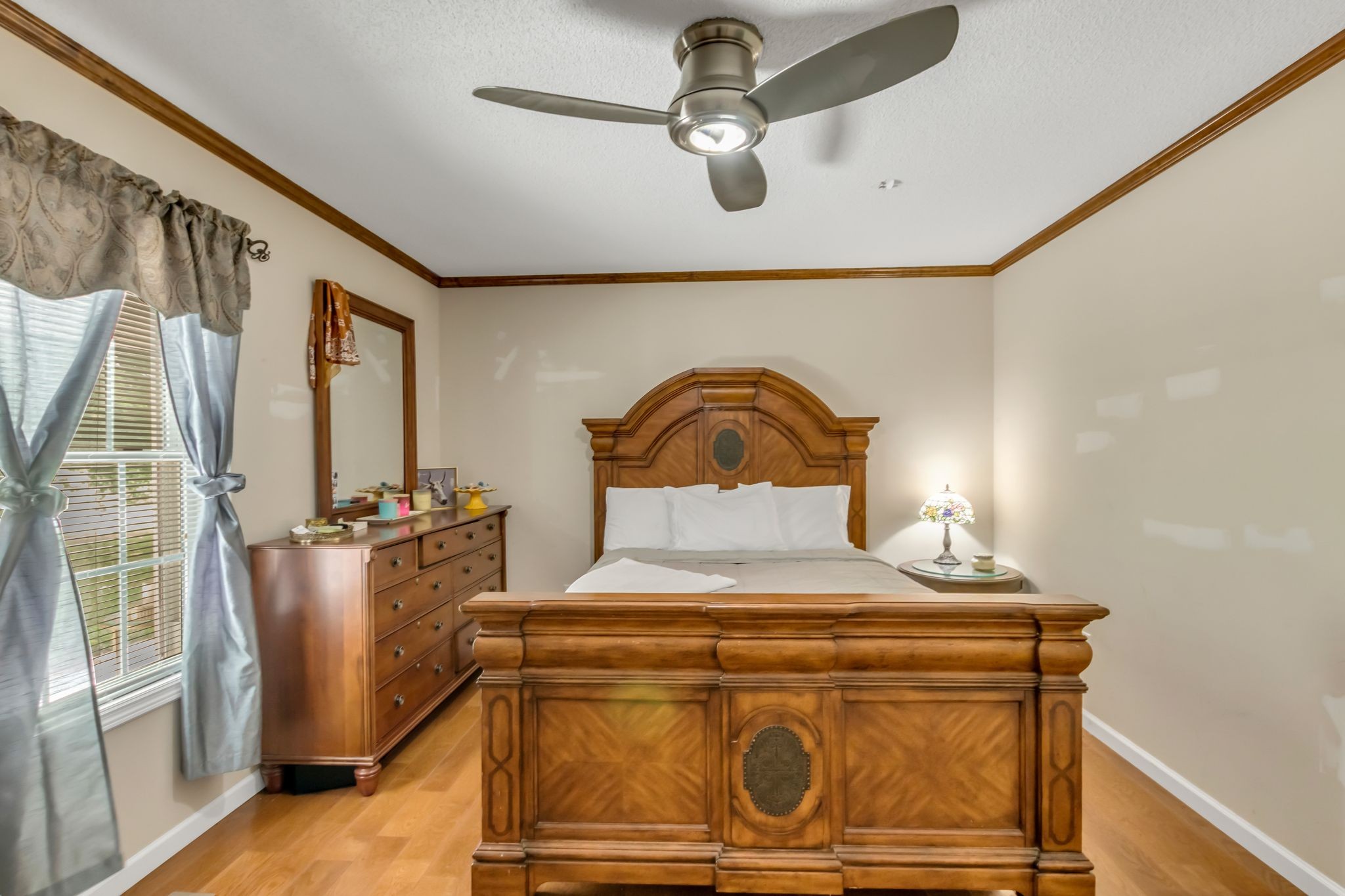 184 Buncombe Road Belvidere, TN 37306 - Photo 17 of 33 a bedroom with a bed and dresser