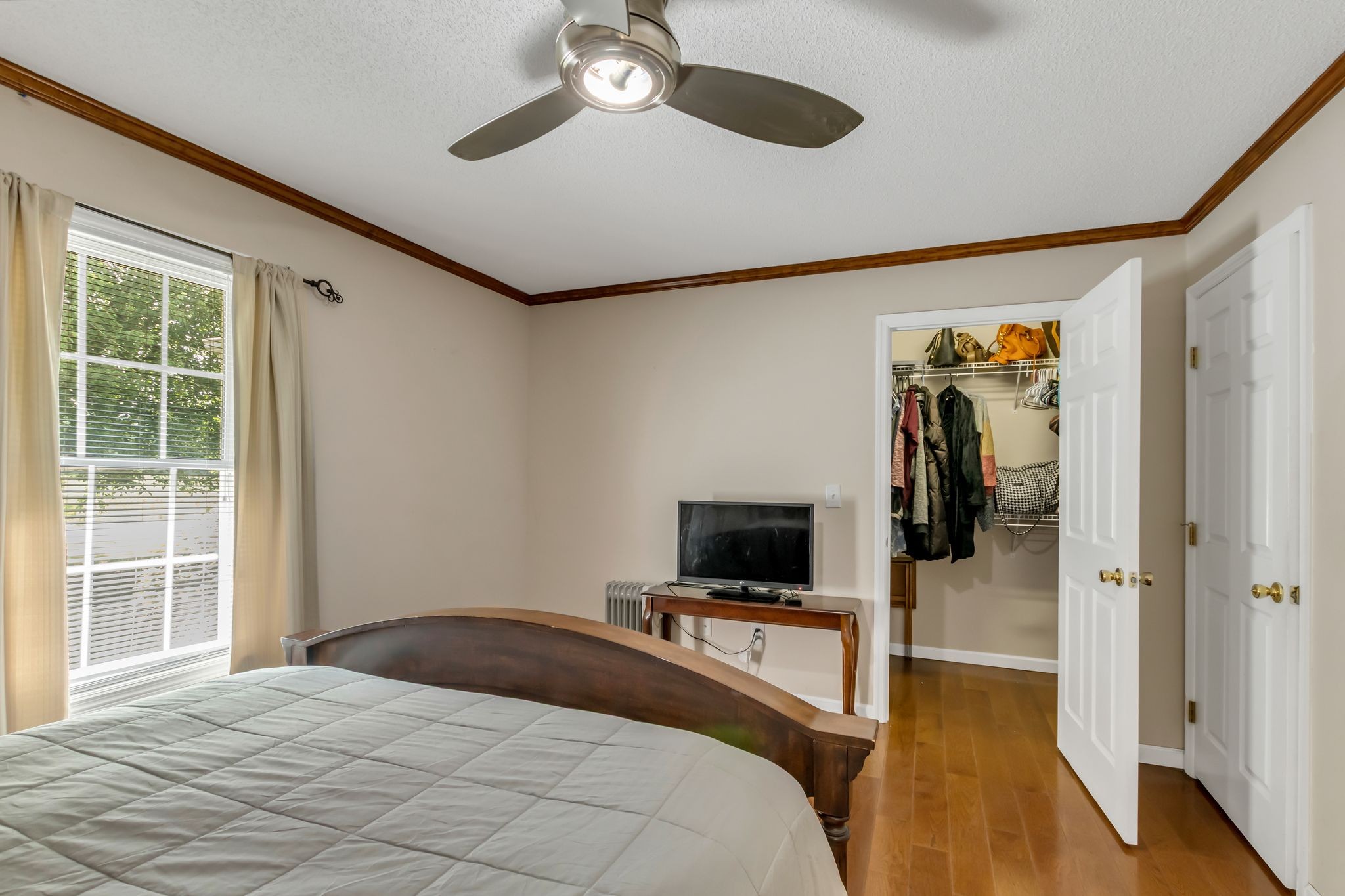 184 Buncombe Road Belvidere, TN 37306 - Photo 22 of 33 a bedroom with a bed and a flat screen tv