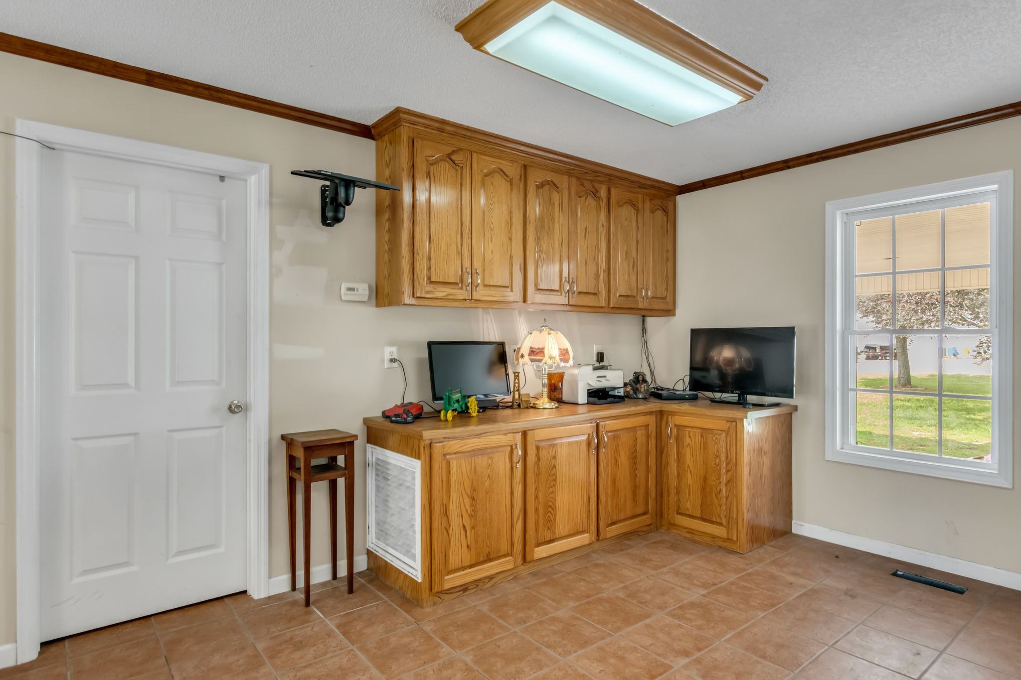 184 Buncombe Road Belvidere, TN 37306 - Photo 27 of 33 a kitchen with stainless steel appliances granite countertop a stove a sink and a refrigerator