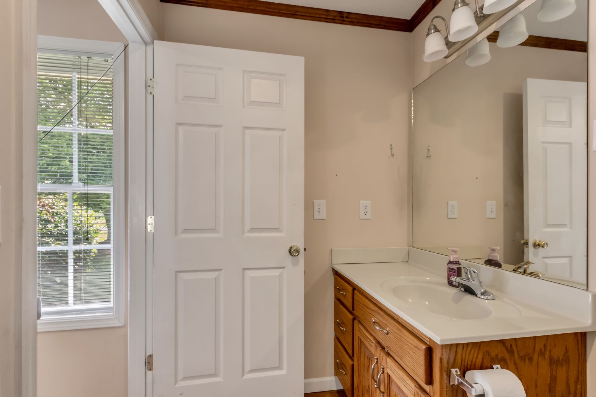 184 Buncombe Road Belvidere, TN 37306 - Photo 28 of 33 a bathroom with a sink and a mirror